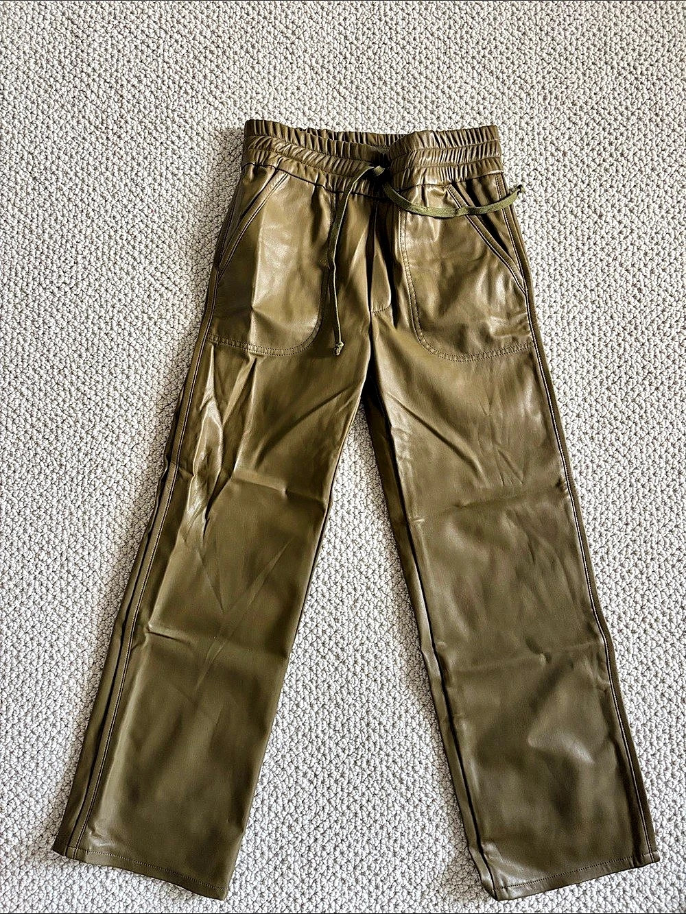 The Rambler Lounger in Army/Fir Green faux leather wax on wax off